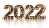 four bookshelves, filled with books, that are in the shape of the numbers 2022